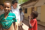 Huw on UNICEF trip speaking to children