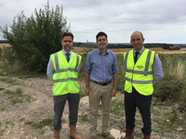 From left, Doug Law, Bovis Homes’ regional land director; Bexhill MP Huw Merriman; and Matt Charnock, Bovis Homes’ strategic development director, on the north Bexhill location